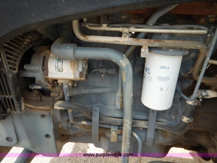 image for item J3955 1998 New Holland TS100 tractor