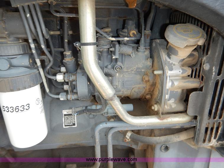 image for item J3955 1998 New Holland TS100 tractor