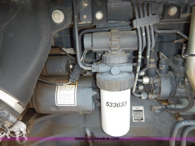 image for item J3955 1998 New Holland TS100 tractor