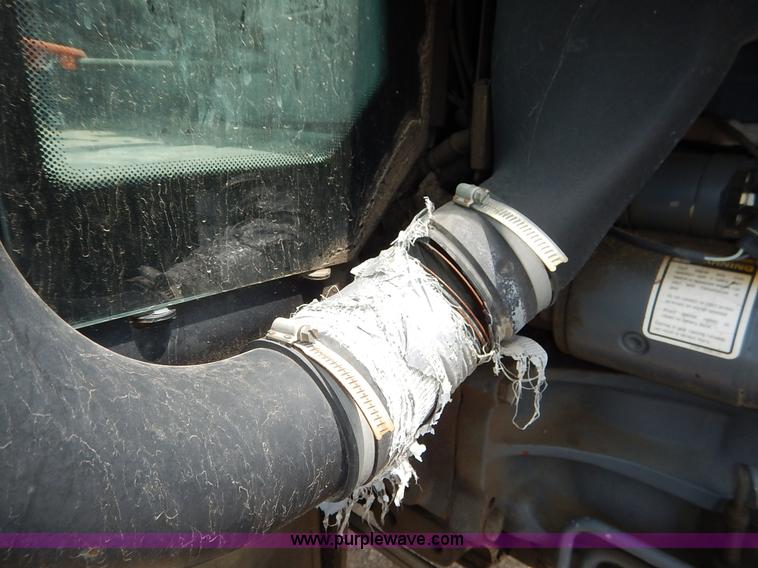 image for item J3955 1998 New Holland TS100 tractor