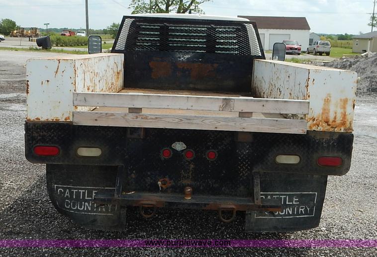 image for item J3956 1985 Ford F350 flatbed pickup truck