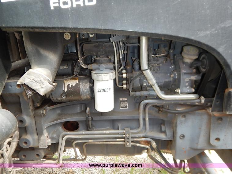 image for item J3960 1998 New Holland TS100 tractor