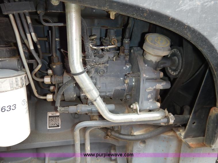 image for item J3960 1998 New Holland TS100 tractor