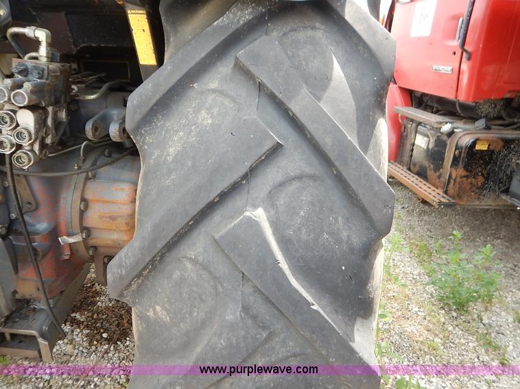 image for item J3960 1998 New Holland TS100 tractor