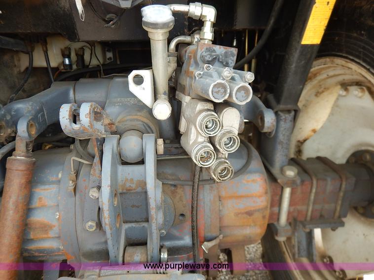 image for item J3960 1998 New Holland TS100 tractor