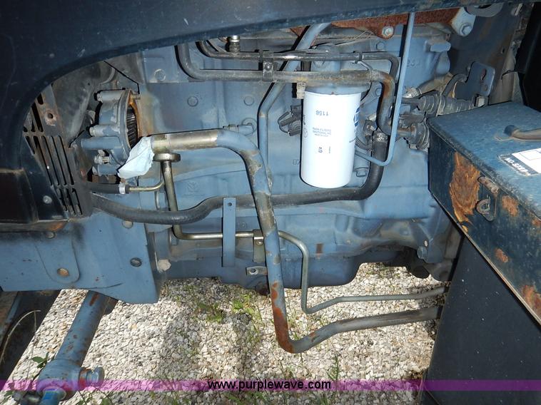 image for item J3960 1998 New Holland TS100 tractor