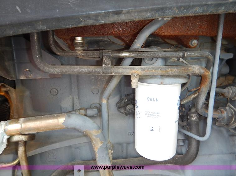 image for item J3960 1998 New Holland TS100 tractor