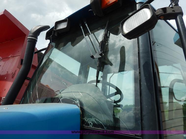 image for item J3960 1998 New Holland TS100 tractor