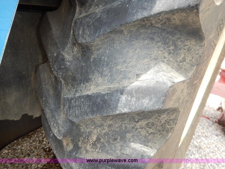 image for item J3960 1998 New Holland TS100 tractor