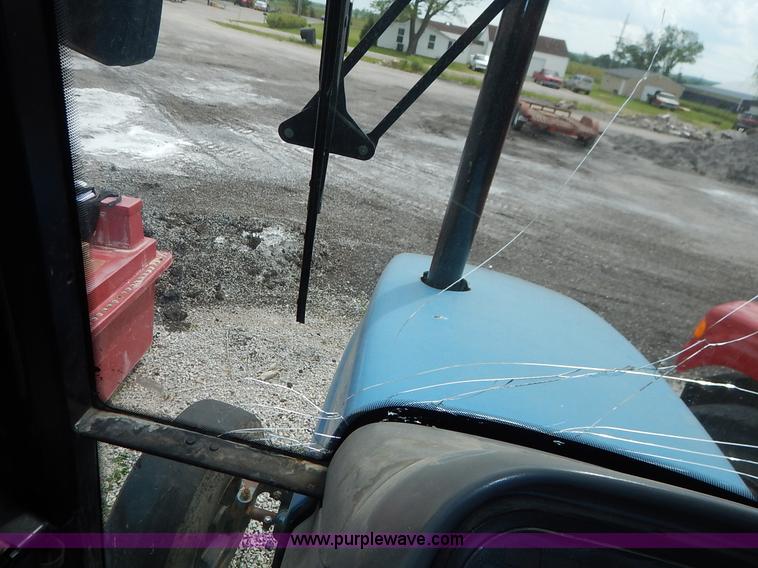 image for item J3960 1998 New Holland TS100 tractor