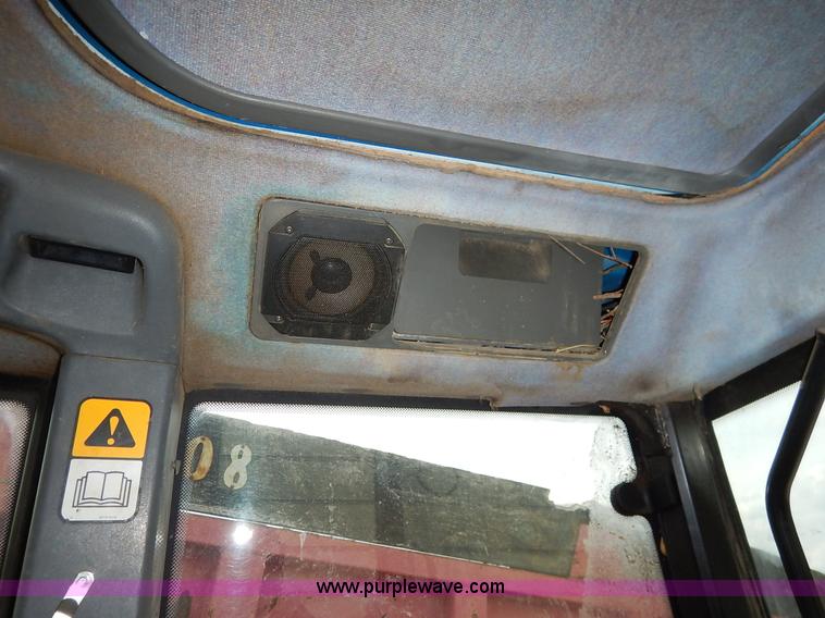 image for item J3960 1998 New Holland TS100 tractor