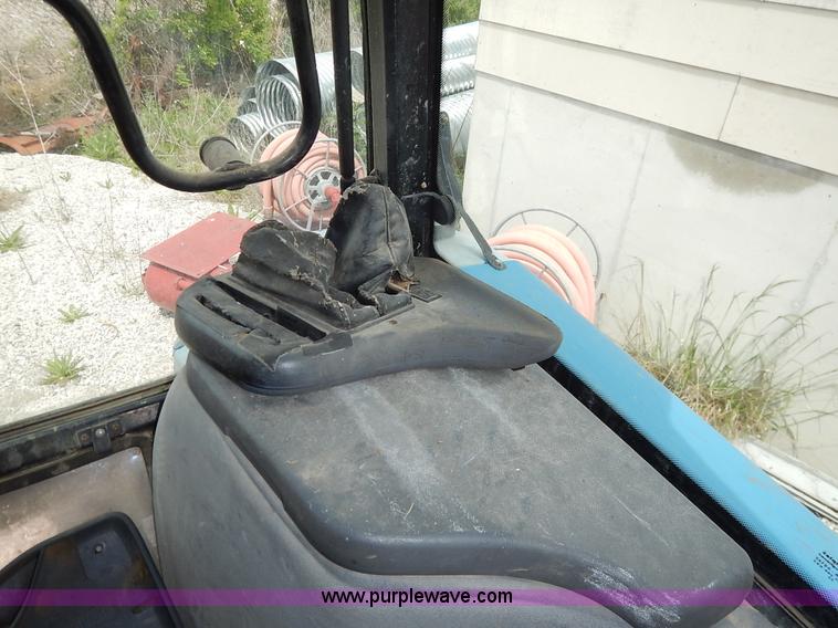 image for item J3960 1998 New Holland TS100 tractor