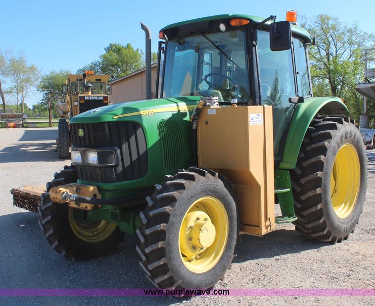 image for item K6949 2006 John Deere 6415 MFWD tractor