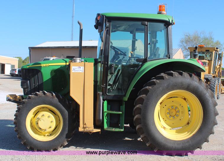 image for item K6949 2006 John Deere 6415 MFWD tractor
