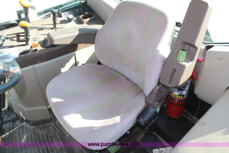 image for item K6949 2006 John Deere 6415 MFWD tractor