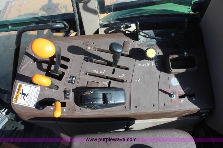 image for item K6949 2006 John Deere 6415 MFWD tractor