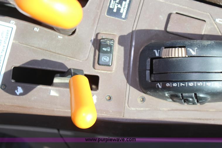 image for item K6949 2006 John Deere 6415 MFWD tractor