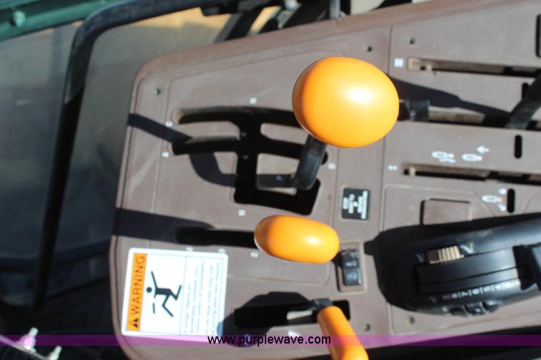 image for item K6949 2006 John Deere 6415 MFWD tractor