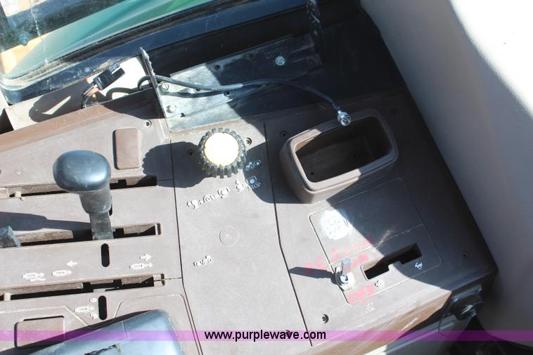 image for item K6949 2006 John Deere 6415 MFWD tractor