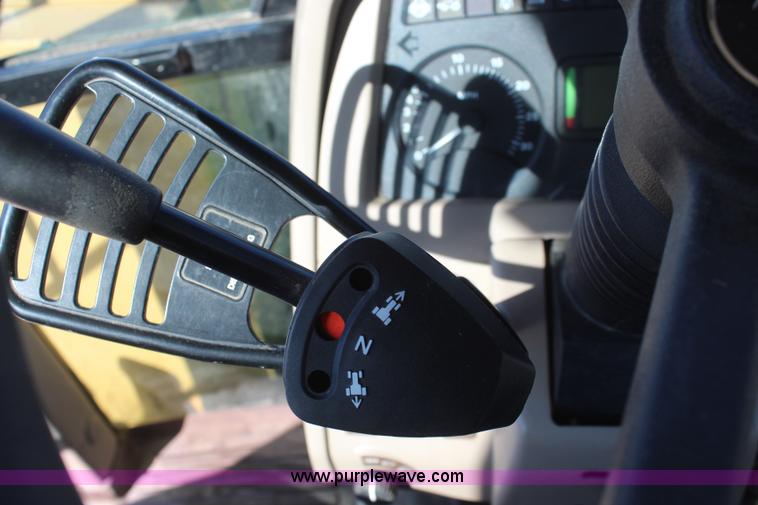 image for item K6949 2006 John Deere 6415 MFWD tractor