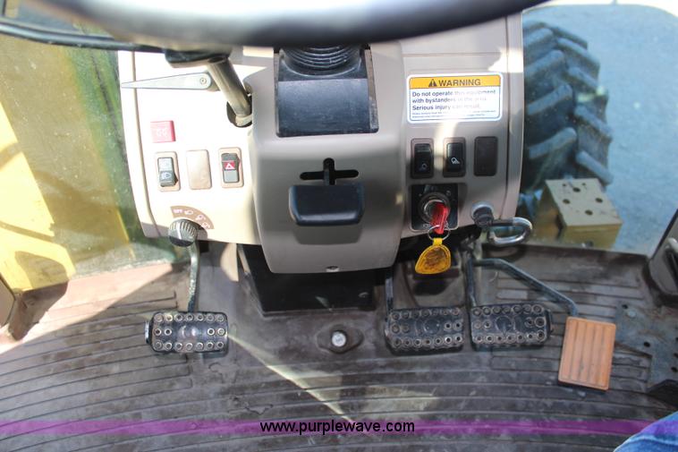 image for item K6949 2006 John Deere 6415 MFWD tractor