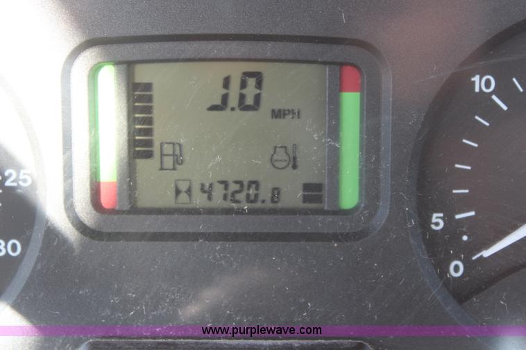 image for item K6949 2006 John Deere 6415 MFWD tractor