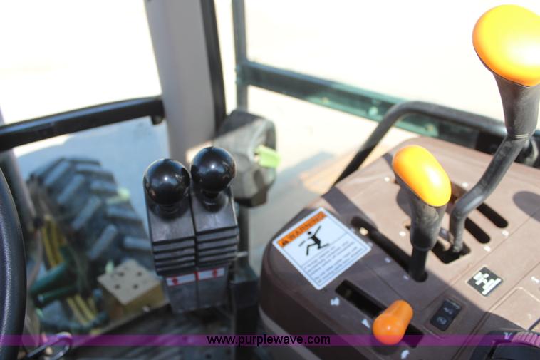 image for item K6949 2006 John Deere 6415 MFWD tractor