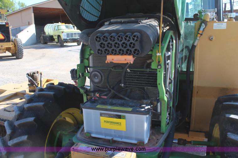image for item K6949 2006 John Deere 6415 MFWD tractor