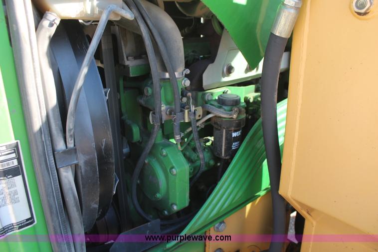 image for item K6949 2006 John Deere 6415 MFWD tractor