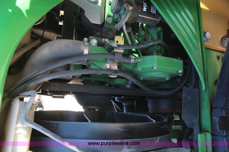 image for item K6949 2006 John Deere 6415 MFWD tractor