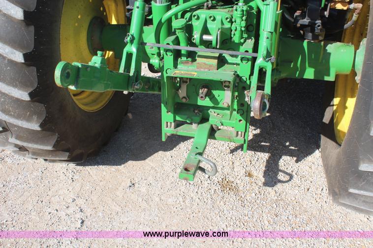 image for item K6949 2006 John Deere 6415 MFWD tractor