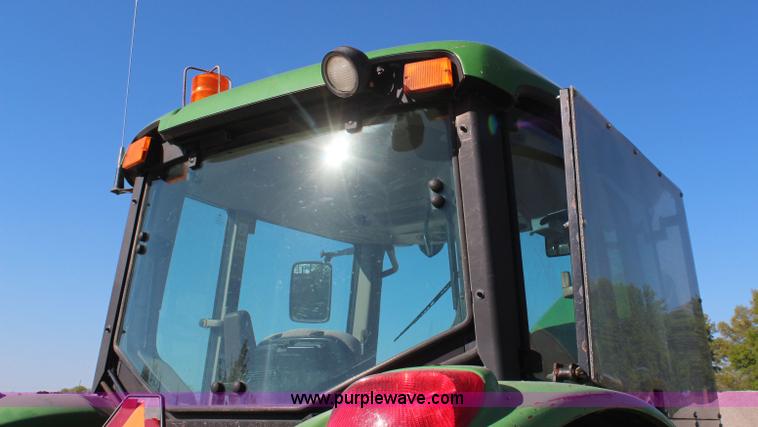 image for item K6949 2006 John Deere 6415 MFWD tractor