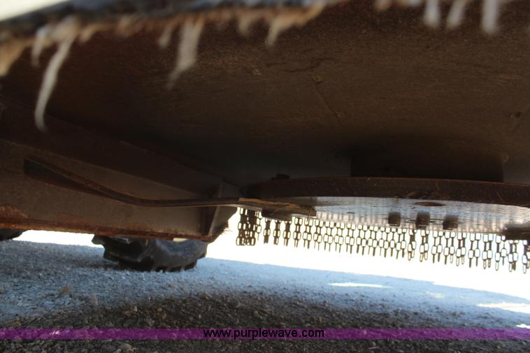 image for item K6949 2006 John Deere 6415 MFWD tractor