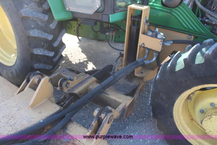 image for item K6949 2006 John Deere 6415 MFWD tractor
