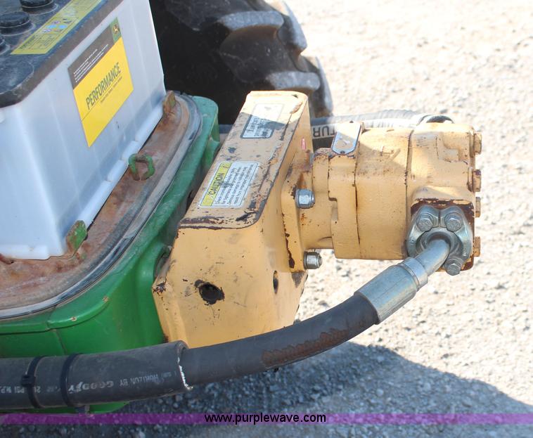 image for item K6949 2006 John Deere 6415 MFWD tractor