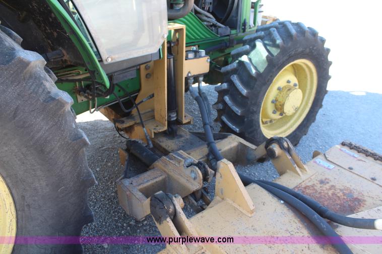 image for item K6949 2006 John Deere 6415 MFWD tractor