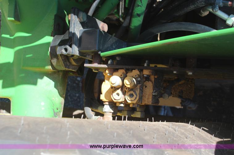 image for item K6949 2006 John Deere 6415 MFWD tractor