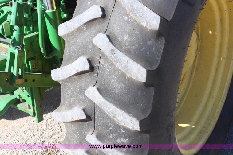 image for item K6949 2006 John Deere 6415 MFWD tractor