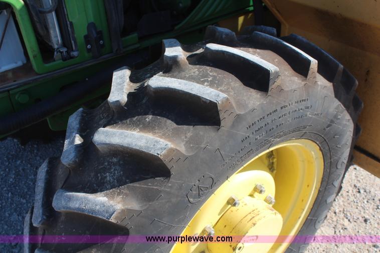 image for item K6949 2006 John Deere 6415 MFWD tractor