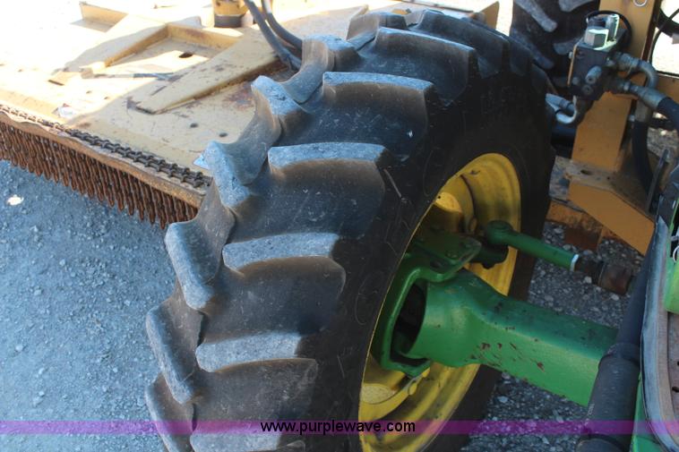 image for item K6949 2006 John Deere 6415 MFWD tractor
