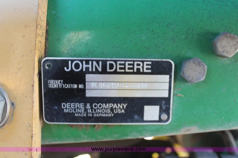 image for item K6949 2006 John Deere 6415 MFWD tractor