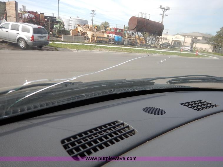 image for item J3936 2006 Dodge Ram 1500 Quad Cab pickup truck