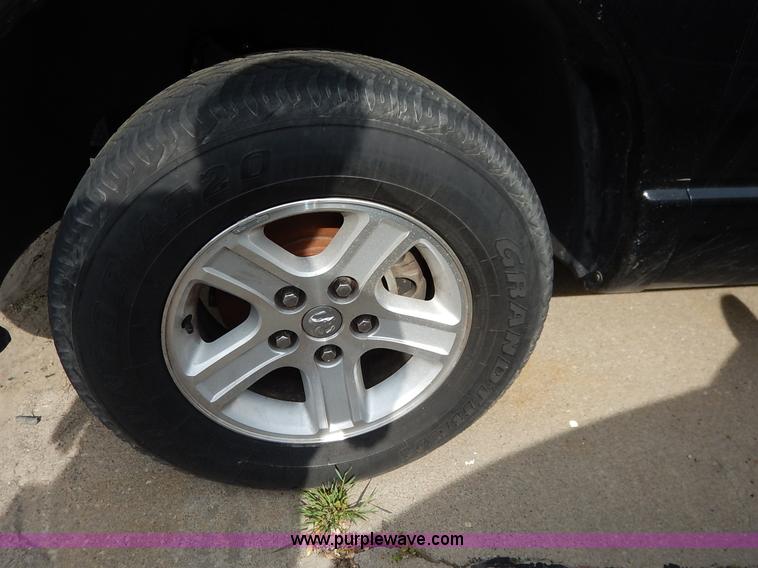 image for item J3936 2006 Dodge Ram 1500 Quad Cab pickup truck