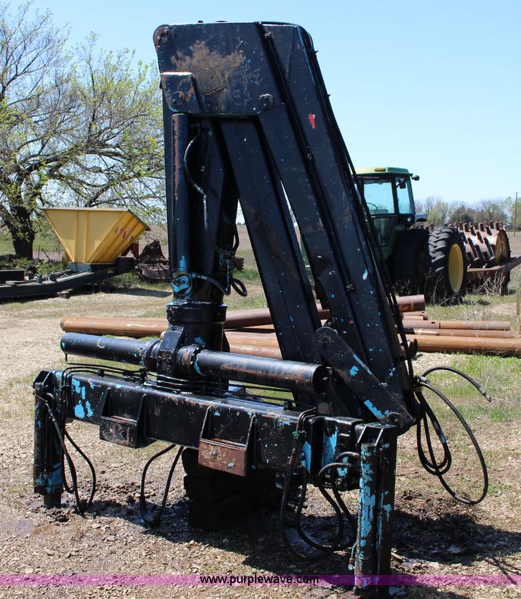 image for item F7712 1976 truck mount knuckle boom