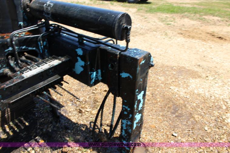 image for item F7712 1976 truck mount knuckle boom