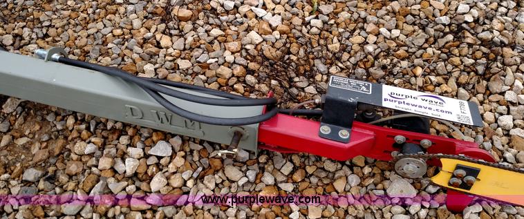 image for item F7789 DWM high reach hydro saw skid steer attachment