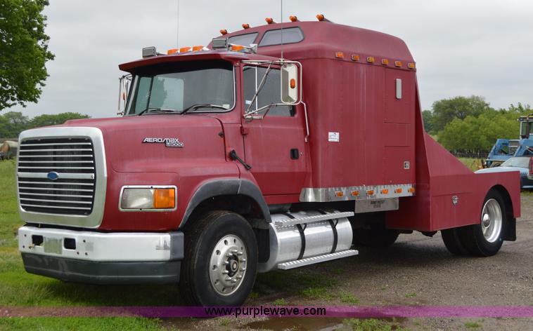 image for item G3512 1995 Ford LA8000 AeroMax 106 flatbed truck