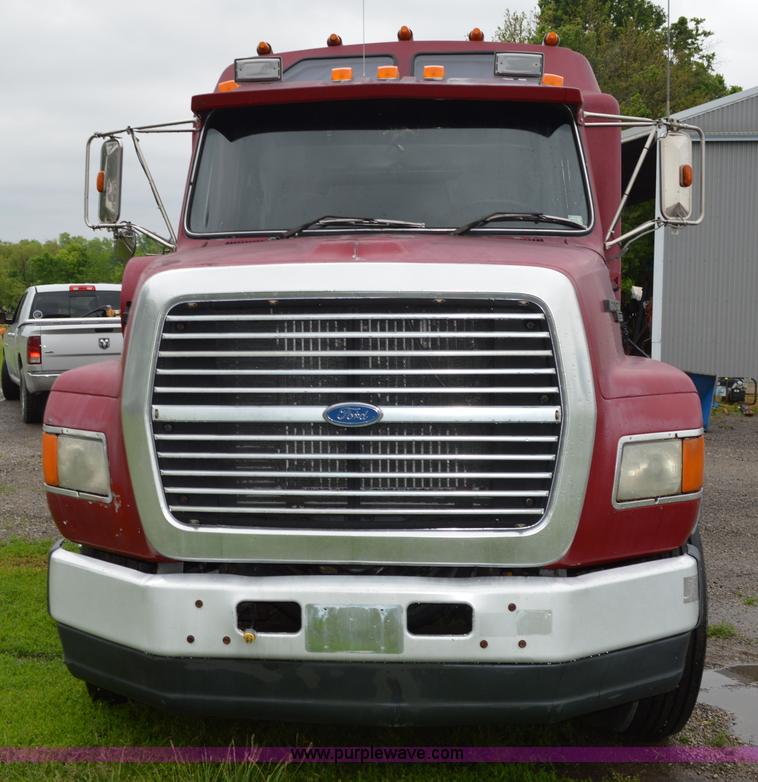 image for item G3512 1995 Ford LA8000 AeroMax 106 flatbed truck