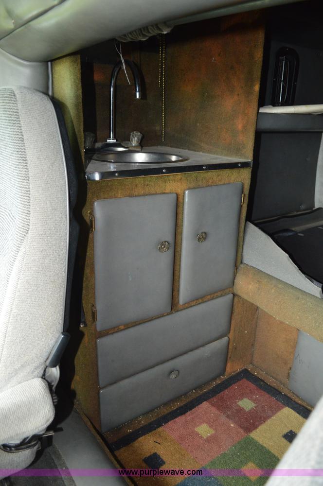 image for item G3512 1995 Ford LA8000 AeroMax 106 flatbed truck