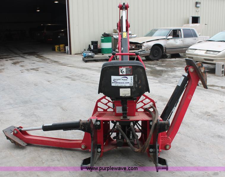 image for item H5815 Mahindra 595 backhoe attachment